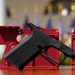 Massachusetts gun owners face an October 28 registration deadline, six days before voters decide whether to repeal the law behind it, while Idaho voters will choose an official state gun from six historic firearms
