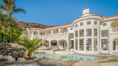 john-stamos-former-california-mansion-drops-from-13-million-to-64-million-after-renovations-.jpg
