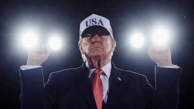 us-president-donald-trump-gestures-during-a-campaign-rally-at-pitt-greenville-airport-in-greenville.jpeg