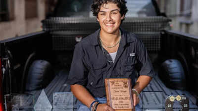 yepez-with-the-award.jpg